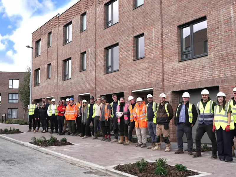YTL Developments, YTL Construction and SNG stand outside affordable housing on Smart Street at Brabazon in North Bristol. 
