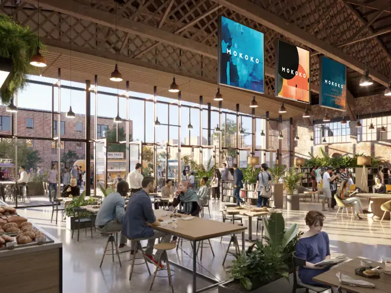 Internal rendering of customers sitting at tables at the new Mokoko Bakery location within The Hangar at Brabazon, Bristol.