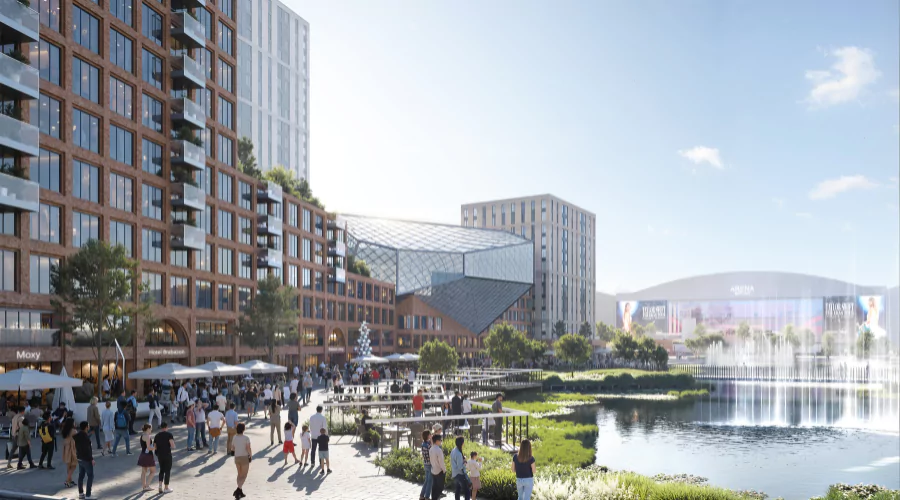 Computer-generated image of busy lakeside cafes, bars and restaurants at Brabazon, with YTL Arena in the background.